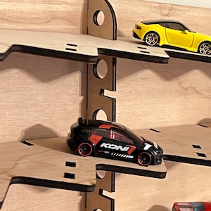 88 car hot new display case, diagonal w/ tilted or flat shelves hold 88 toy die cast cars Show off your 1:64th scale wheels!  Made in USA!