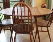Ercol round dining table Drop-leaf Ercol table light finish 1960 39 s fully restored extending Ercol table