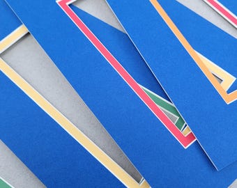 Four 8x10 Bright Blue/Assorted Picture Mats, White Core