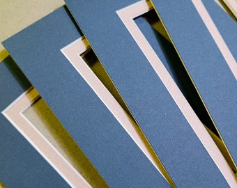 Cuatro portafotos azules y rosas de 5x7, núcleo blanco
