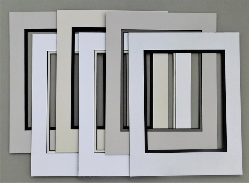 Six 11x14 Black Core Picture Mats, Vertically Formatted, Assorted