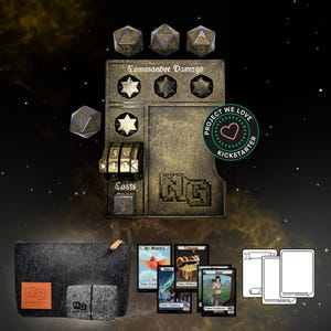 May include: A set of tabletop game components including a metal game board with a gold finish, dice, and cards. The game board has a section labelled "Commander Damage" and a section labelled "Costs". The cards are labelled "Jay Nuisance", "Treasure", and "Deer". The game board also has a green and red sticker that says "Project We Love Kickstarter".