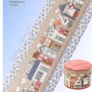 May include: Cross stitch pattern for a seaside town with the text "SEASIDE tiny town". The pattern includes a variety of houses, a lighthouse, and other details. Embellishments are included.