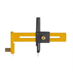 May include: A yellow and black circle cutter with a sliding adjustment for different circle sizes. The cutter is made in Japan and has a black handle with a brass knob.