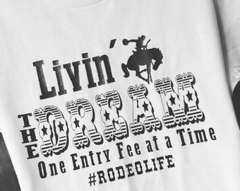 Download Living the dream one entry fee at a time rodeo life svg ...