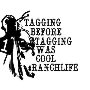 May include: Black and white silhouette of a cowboy with a number "1" on his chest. The text "Tagging before tagging was cool #ranchlife" is written in a bold font.