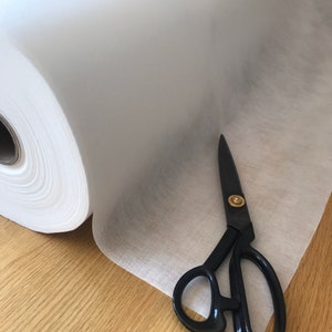 Interfacing. Black/White Sew-In Medium Weight non woven material perfect for dressmaking and face mask linings and filters. Interlining