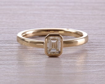 0.70 carat Emerald Cut Diamond set 18ct Yellow Gold Solitaire
