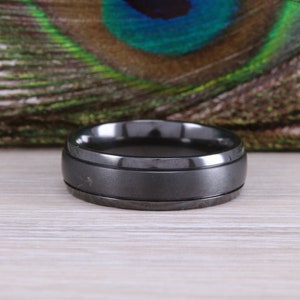 Titanium patterened hammered finish band, light weight and very durable, choice of widths , perfect as wedding band or fashion ring