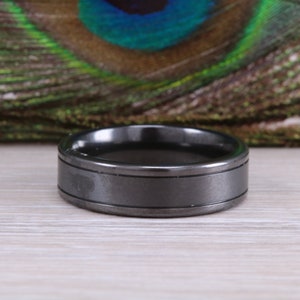 Titanium patterened hammered finish band, light weight and very durable, choice of widths , perfect as wedding band or fashion ring