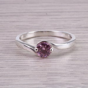 Dainty Silver Solitaire ring set with beautiful round cut Pink Cubic Zirconia