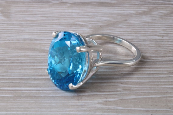 Silver Petite Solitaire Blue Topaz Ring - Afrogem Jewellers