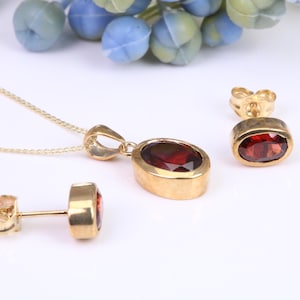 Oval cut Garnet Earrings and Matching Necklace set in Yellow Gold