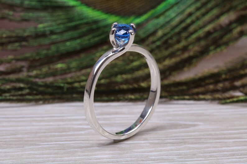 Silver solitaire ring with four claw twist setting of beautiful round royal blue sapphire C Z image 4