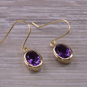 Natural Oval cut Amethyst dropper earrings, set in solid 9ct Yellow gold