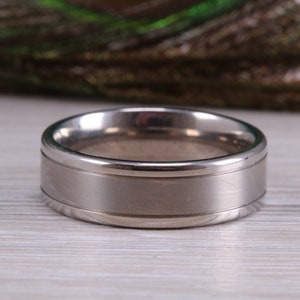 Titanium patterened band, light weight and very durable, choice of widths , perfect as wedding band or fashion ring