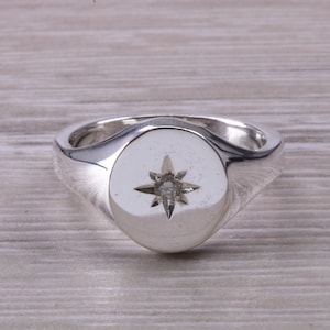 Chunky Oval Faced Diamond set Signet Ring in Silver