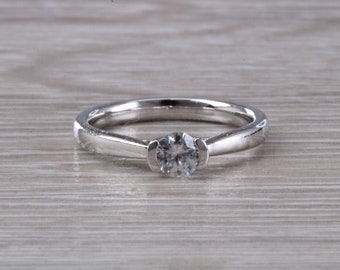 Petite and Simple Round cut Diamond Solitaire