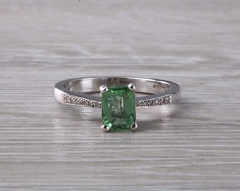 Brazilian Paraiba Tourmaline and  Diamond set Platinum Ring