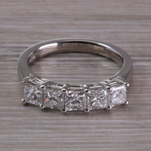 Stunning One and Quarter carat 5 Princess cut Diamonds set Platinum Ring
