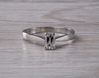 Emerald cut Diamond set Platinum Solitaire