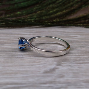 Silver solitaire ring with four claw twist setting of beautiful round royal blue sapphire C Z image 9
