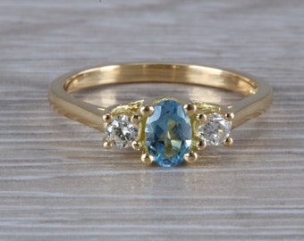 Aquamarine and Diamond Trilogy Ring