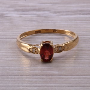 Dainty Garnet and Diamond set Gold Ring