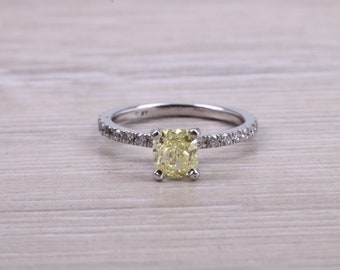 Natural 0.97ct Yellow Emerald cut Diamond with White Diamond set Shoulders Platinum Ring