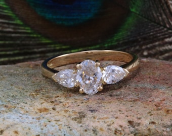 One carat Certified Oval and Pear Drop cut Diamond Trilogy Ring