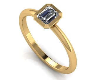 0.70 carat Emerald Cut Diamond set 18ct Yellow Gold Solitaire