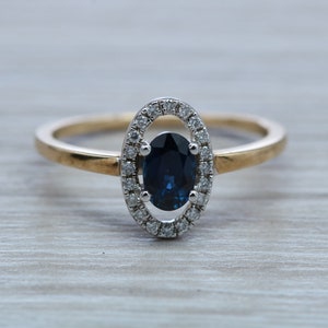 Beautiful Halo set Blue Sapphire and Diamond Ring