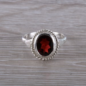Oval cut Garnet set Silver Ring