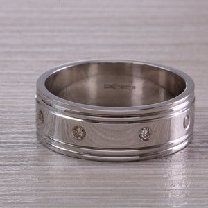 Heavy and Chunky Eight Diamond set 8 mm Wide Platinum Band