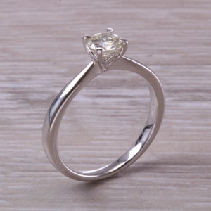 Half carat Round Cut Diamond set Platinum Solitaire