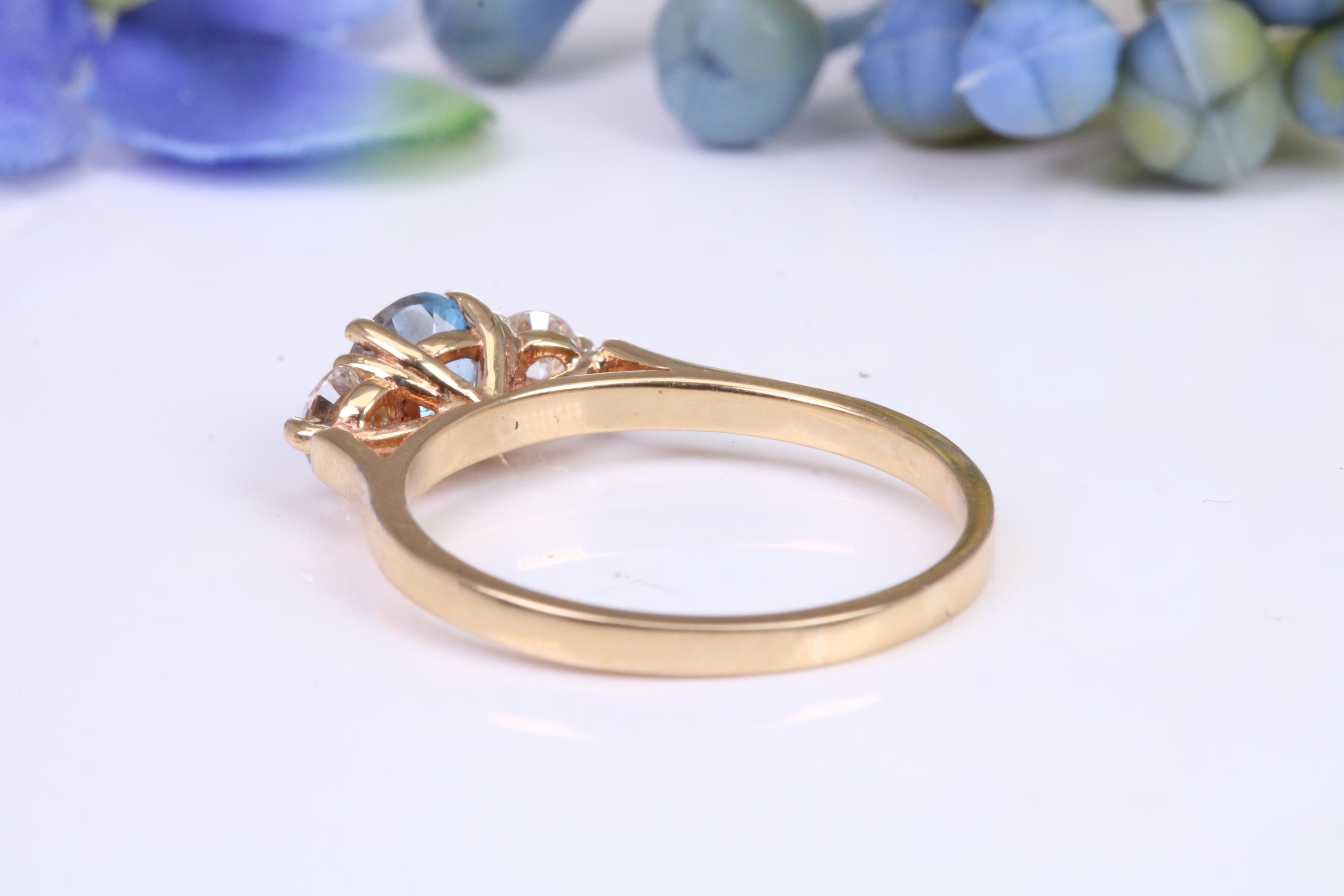 Aquamarine and Diamond set Trilogy Ring