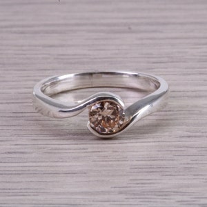 Dainty Silver Solitaire ring set with beautiful 5 mm round cut Champagne C Z