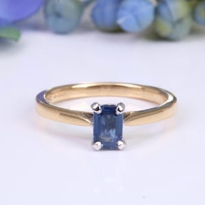 Dainty 0.62 carat Rectangle Emerald cut Blue Sapphire Solitaire, made from 8ct Yellow Gold and complimented with a Platinum setting