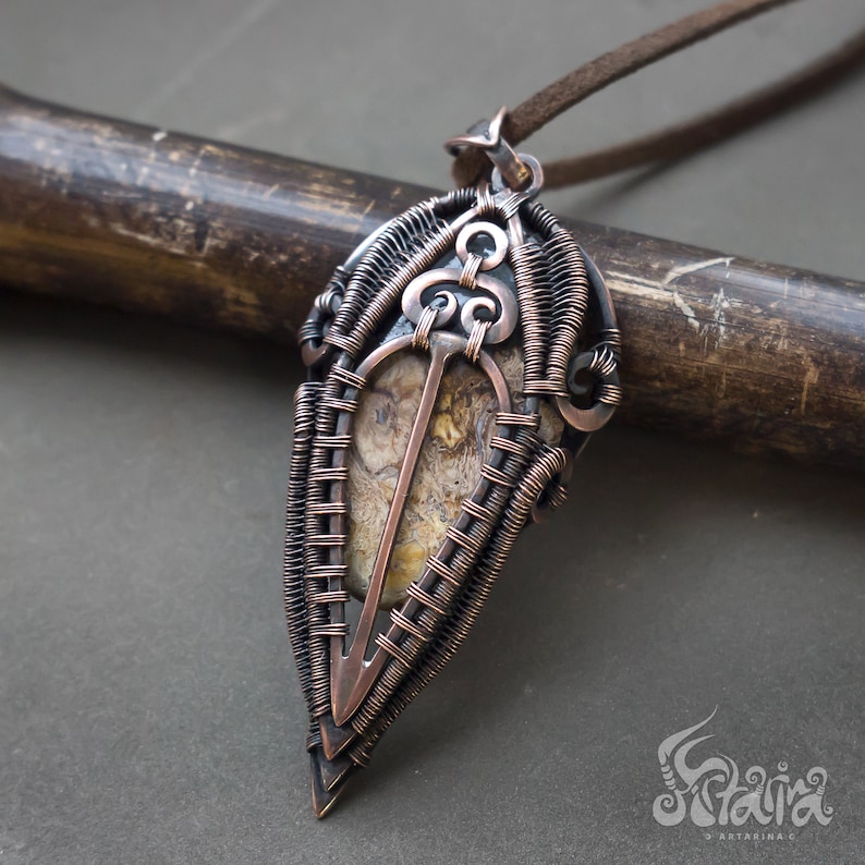 Wire wrapped copper pendant with petrified wood