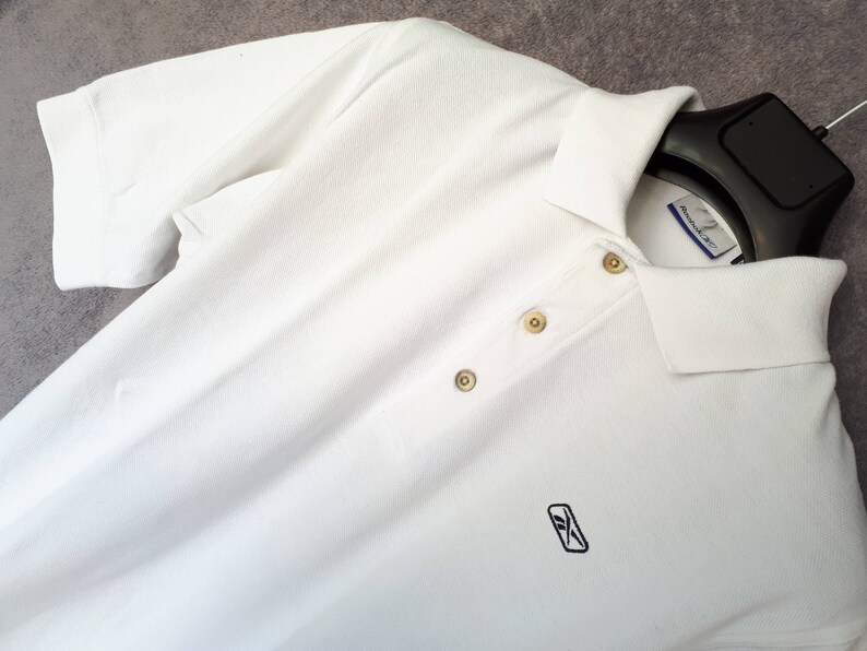 polo reebok blanche
