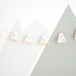 Personalised fairy lights with pink pom poms