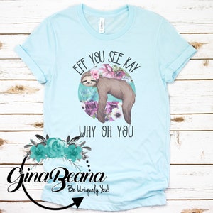 May include: Light blue t-shirt with a sloth wearing a floral crown and the text "Eff you see kay why oh you".