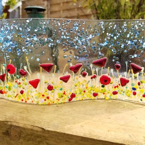 Fused glass field of poppies window ornament in four colours