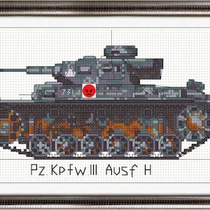 May include: A cross-stitch pattern of a gray German Panzerkampfwagen III Ausf. H tank. The tank is on a white background with the text "Pz. Kpfw. III Ausf. H" below it.