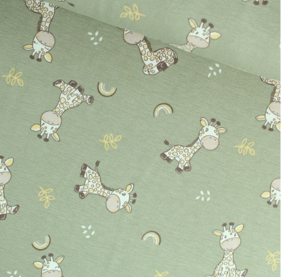 Cute Giraffes Jersey Fabric for Babies and Toddlers Green Background
