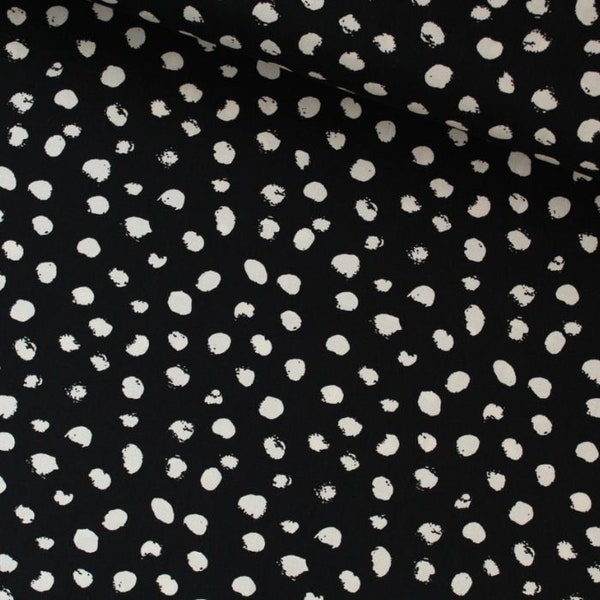 Viscose fabric - small irregular ecru dots on black - from 0.5 meters