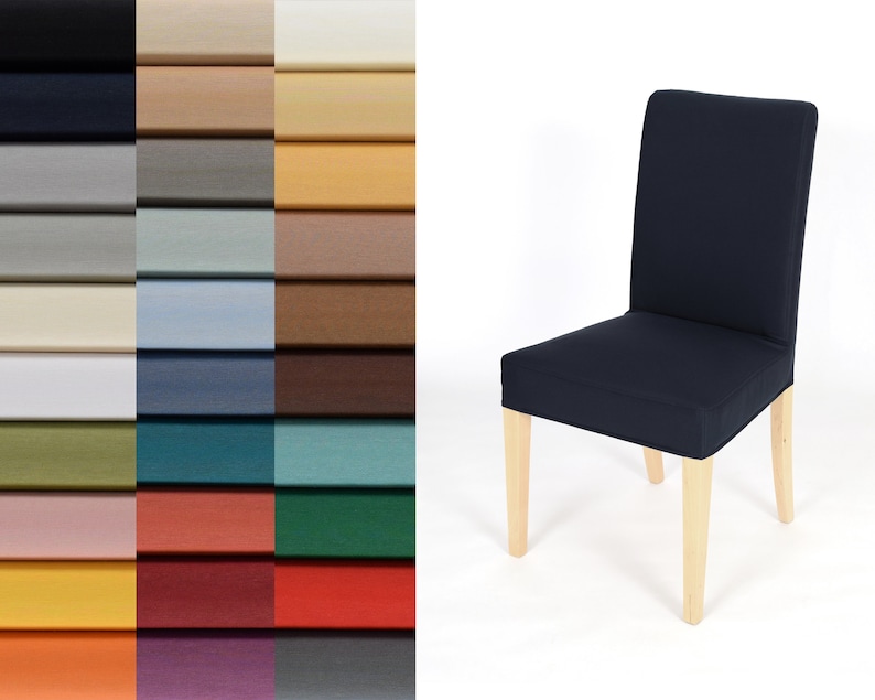 May include: A navy blue chair cover with wooden legs. The cover is made of a soft, stretchy fabric and is available in a variety of colors.