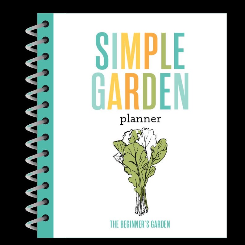 May include: A white spiral bound planner with the text "SIMPLE GARDEN planner" in colourful letters. The cover features a line drawing of a bunch of green leafy vegetables. The text "THE BEGINNER'S GARDEN" is at the bottom of the cover.