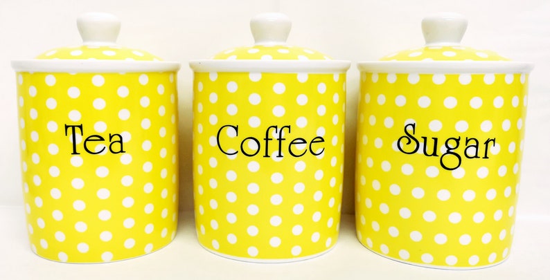 yellow tea coffee sugar canisters bone China with white spots