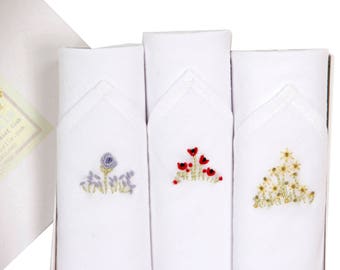 Set of three ladies handkerchiefs with hand embroidered flowers